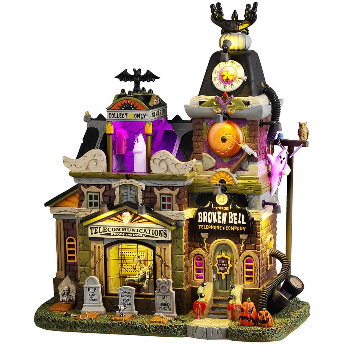 Resin lighted building for a Lemax display. Designed to look like a spooky mansion turned into a telephone company. There are tombstones and jack-o-lanterns in front and ghosts near the roof. It's a little rundown and there are purple lighted accents.