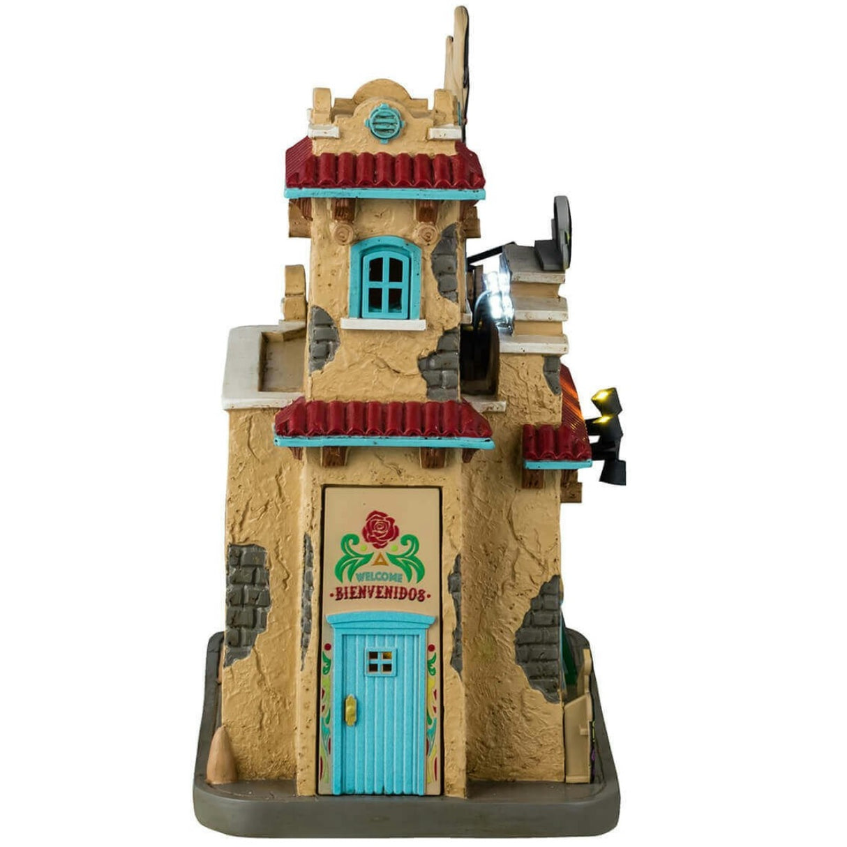 Resin lighted building for a Lemax display. Designed to look like a Spanish colonial building decorated for Day of the Dead. There are sugar skull accents and candles and flowers.