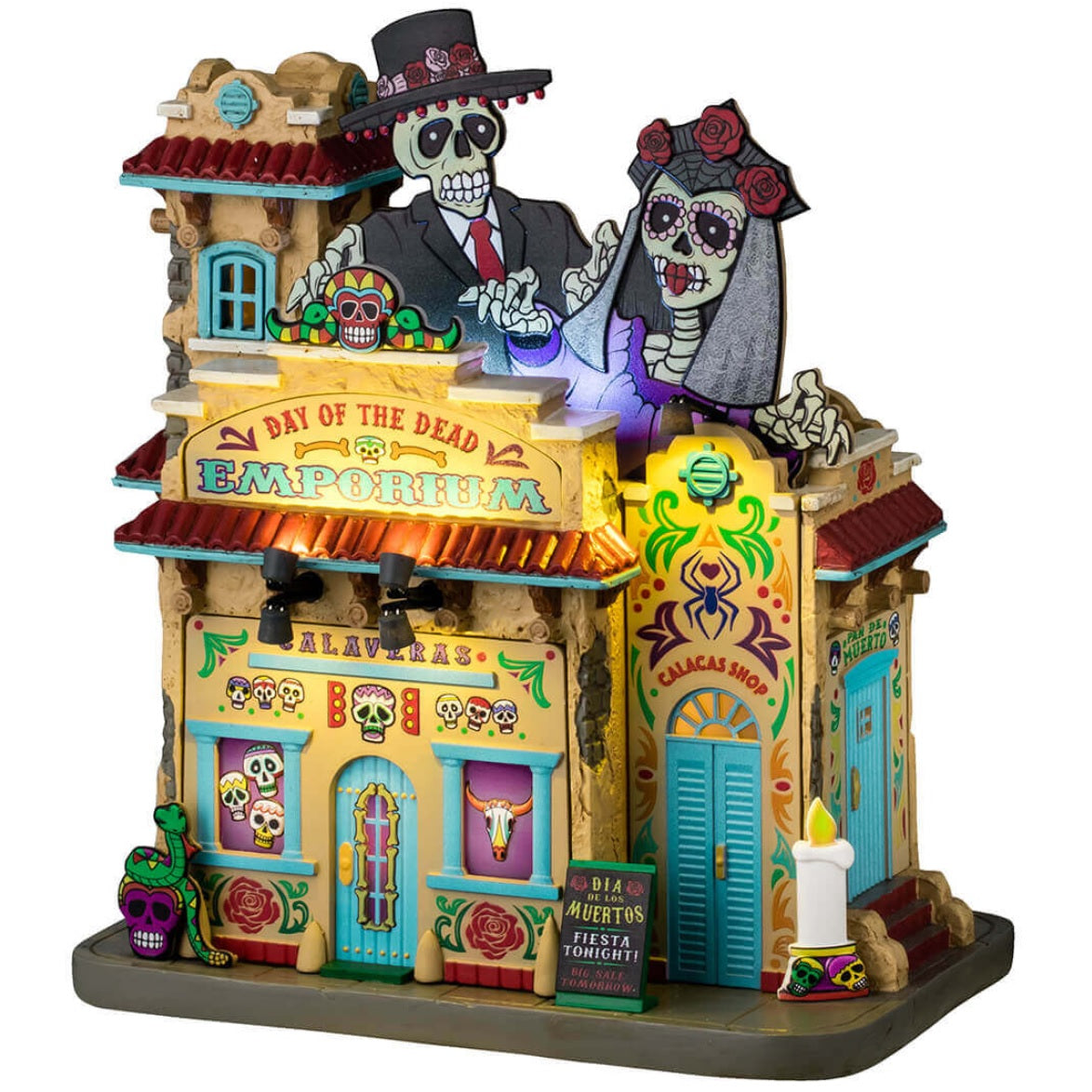 Resin lighted building for a Lemax display. Designed to look like a Spanish colonial building decorated for Day of the Dead. There are sugar skull accents and candles and flowers.