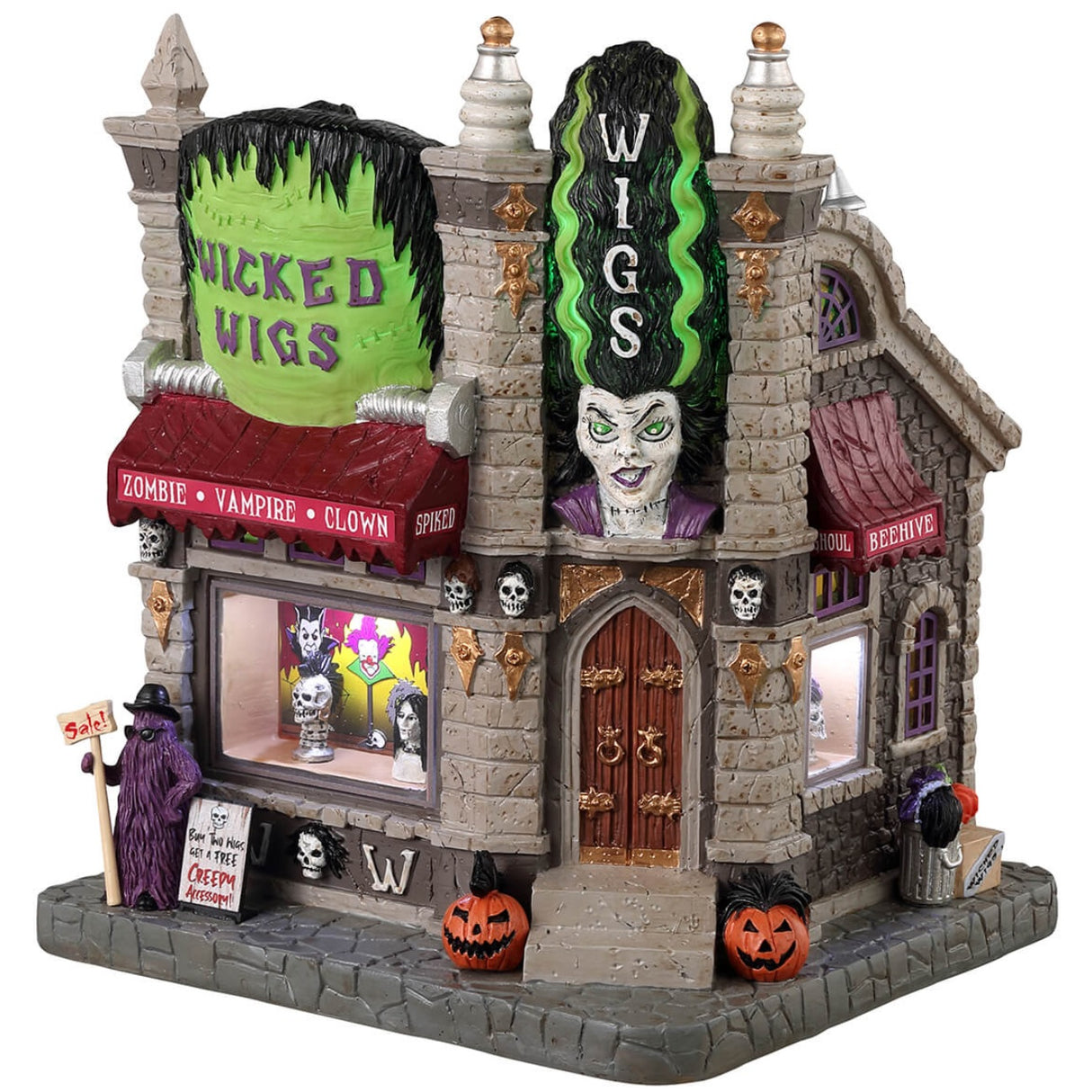 Resin lighted building for a Lemax display. Designed to look like a gothic wig store. The sign reads "WICKED WIGS" and looks like the top of Frankenstein's head. There's also a statue of the Bride of Frankenstein. There are skulls and pumpkins and cousin IT standing outside. They sell zombie wigs, vampire wigs, clown wigs and more.