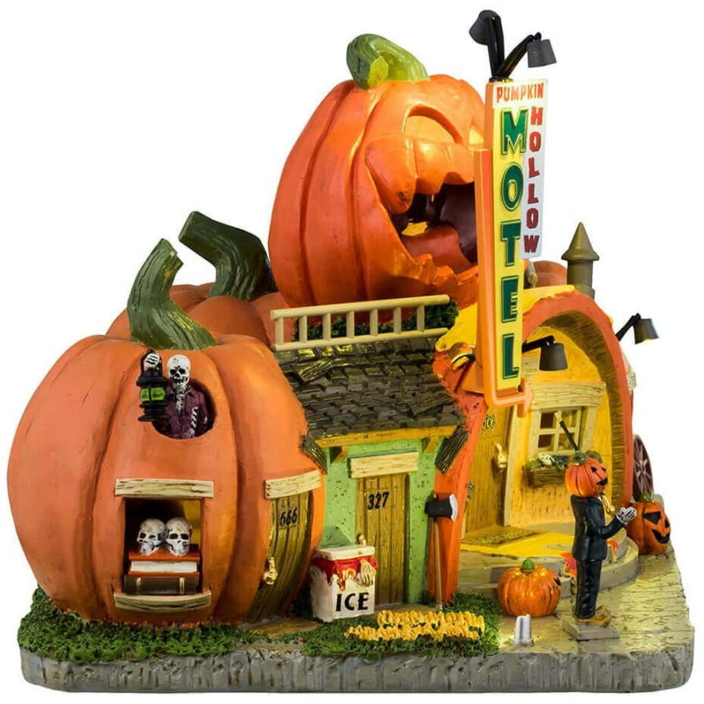 Resin lighted building for a Lemax display. Designed to look like a motel made out of pumpkins.