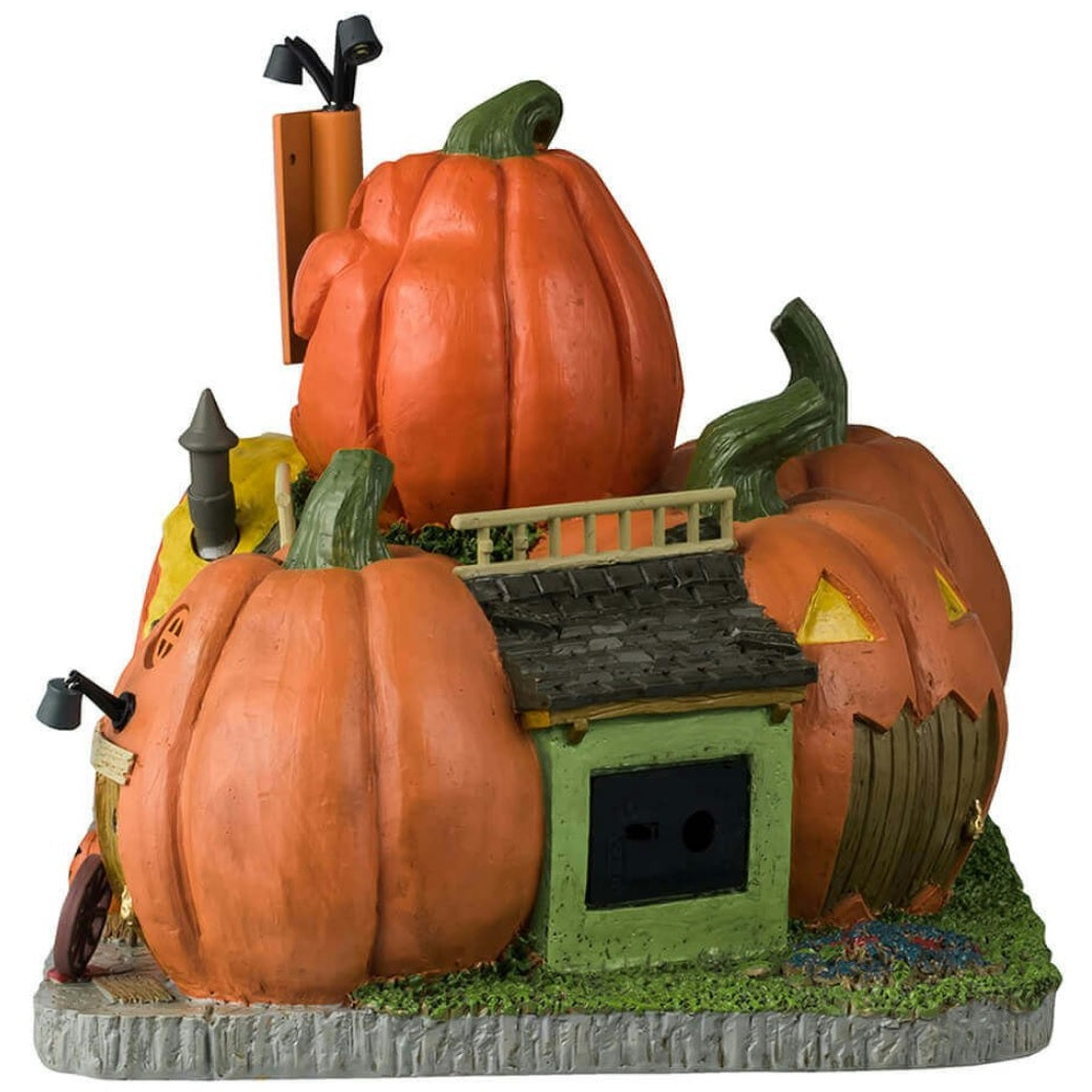 Resin lighted building for a Lemax display. Designed to look like a motel made out of pumpkins.