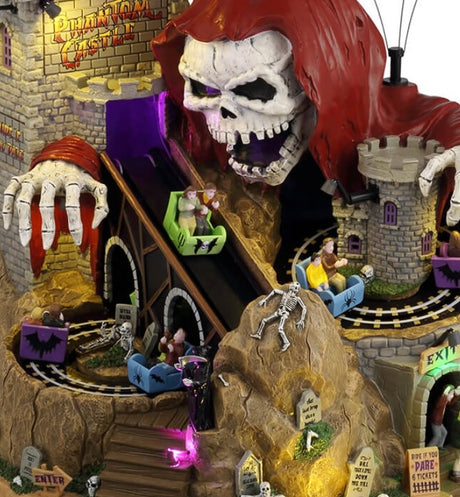 Resin lighted building for a Lemax display. Designed to look like a castle roller coaster with a skeletal grim reaper statue staring menacingly at the roller coaster carts. There are kids riding the ride and bats flying above.