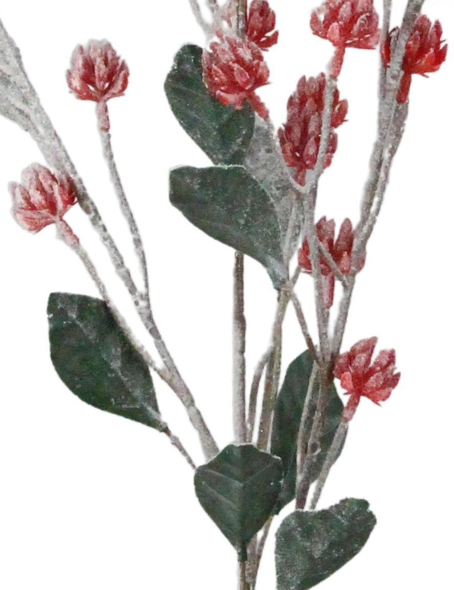 Pick spray designed to look like green stems with red flower buds. Decorated to appear covered in snow.