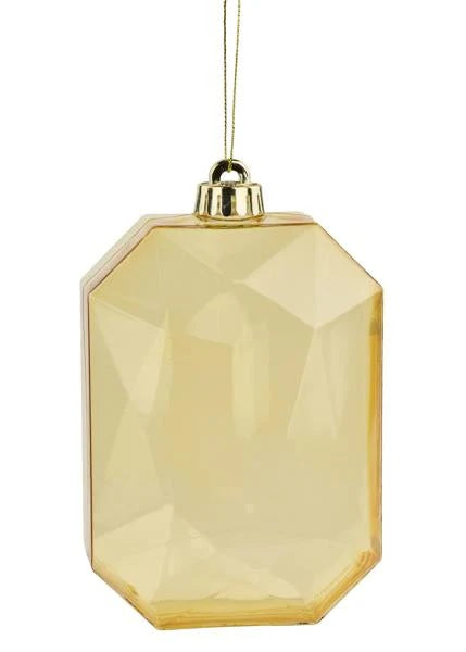 A gold, plastic rectangular gem ornament.