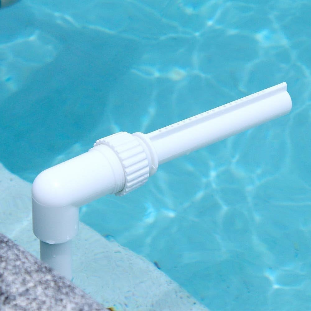 White waterfall fountain that attaches to your pool's water return fitting.