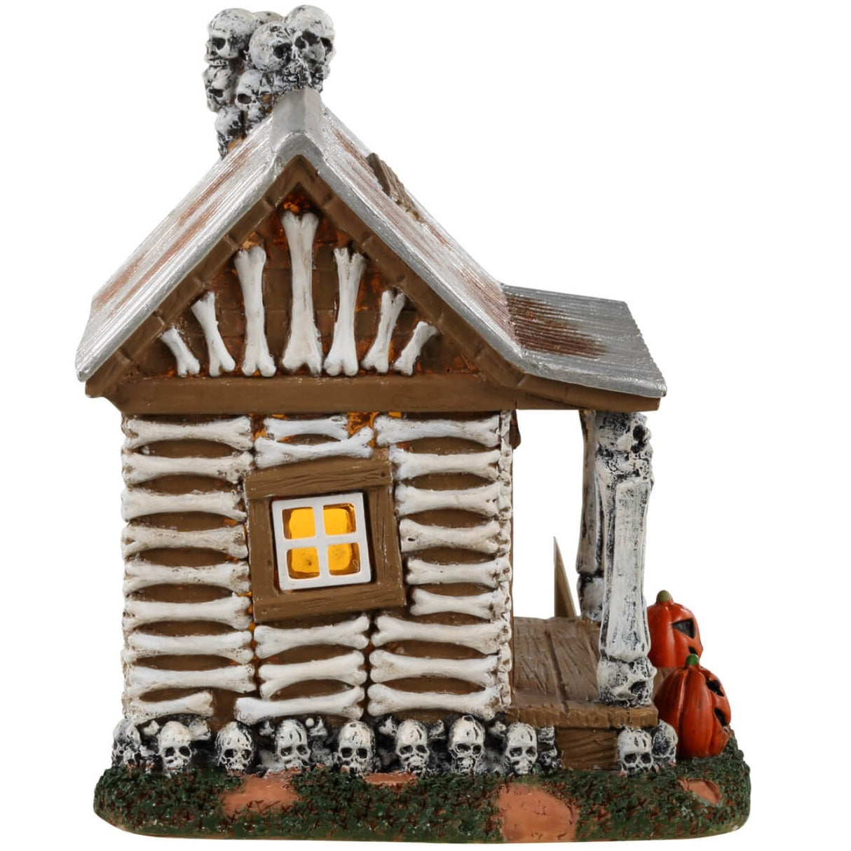 Resin village accent for a Lemax display. Designed to look like an old cabin made out of bones and skulls and wood. There are carved pumpkins on either side of the front door along with a sign that reads "KEEP OUT!"