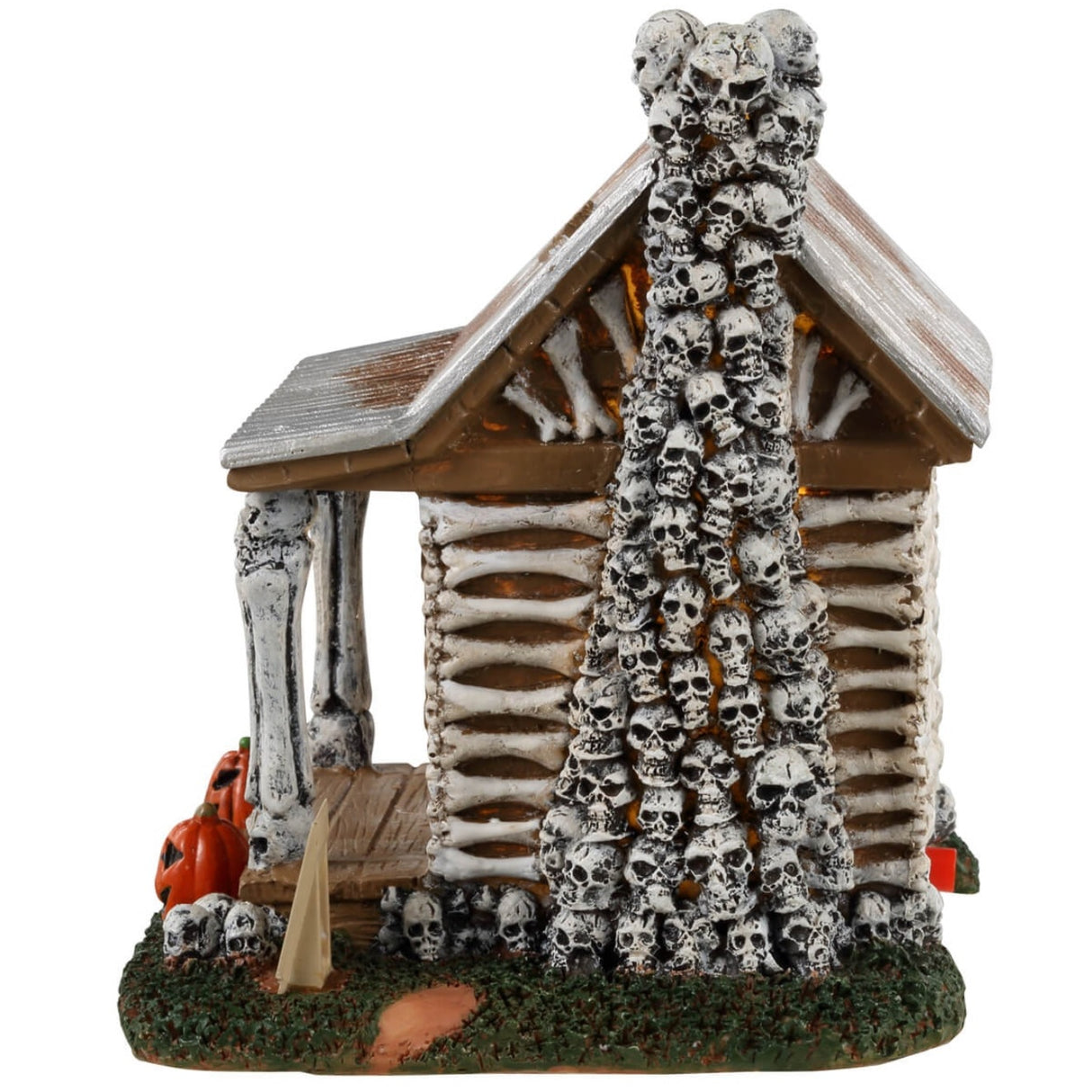 Resin village accent for a Lemax display. Designed to look like an old cabin made out of bones and skulls and wood. There are carved pumpkins on either side of the front door along with a sign that reads "KEEP OUT!"