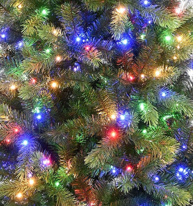 Artificial tree pre-lit with color changing LED lights.