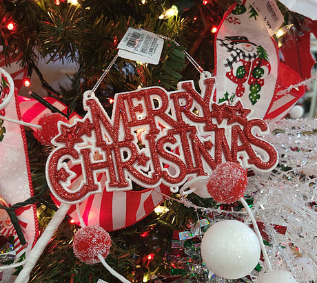 Ornament that reads "Merry Christmas" and features four stars. One ornament is white text on a red background. One ornament is red text on a white background.