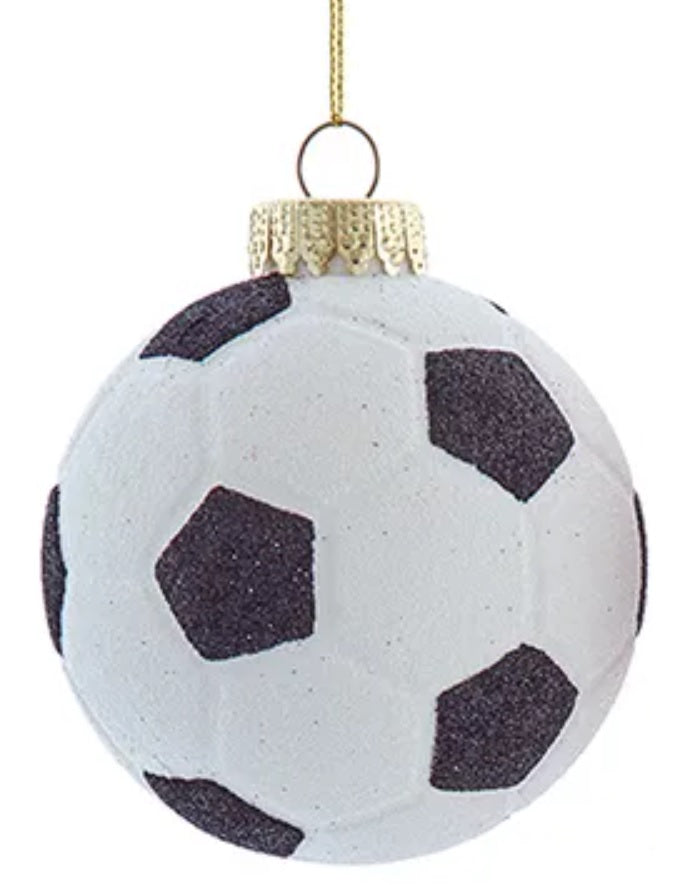 Ornament shaped like a soccer ball decorated with black and white glitter.