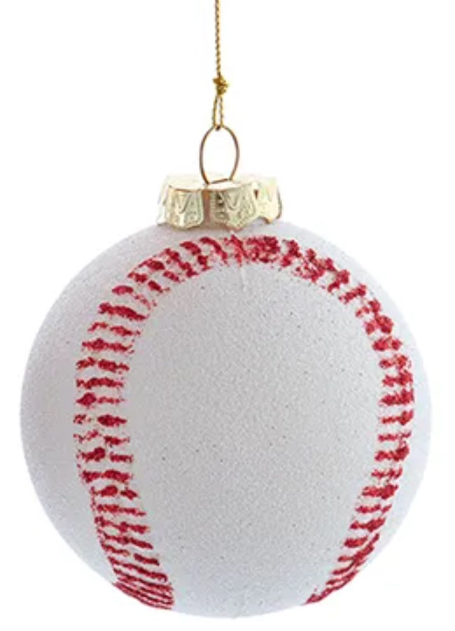 Ornament shaped like a baseball decorated with white glitter and red glitter.