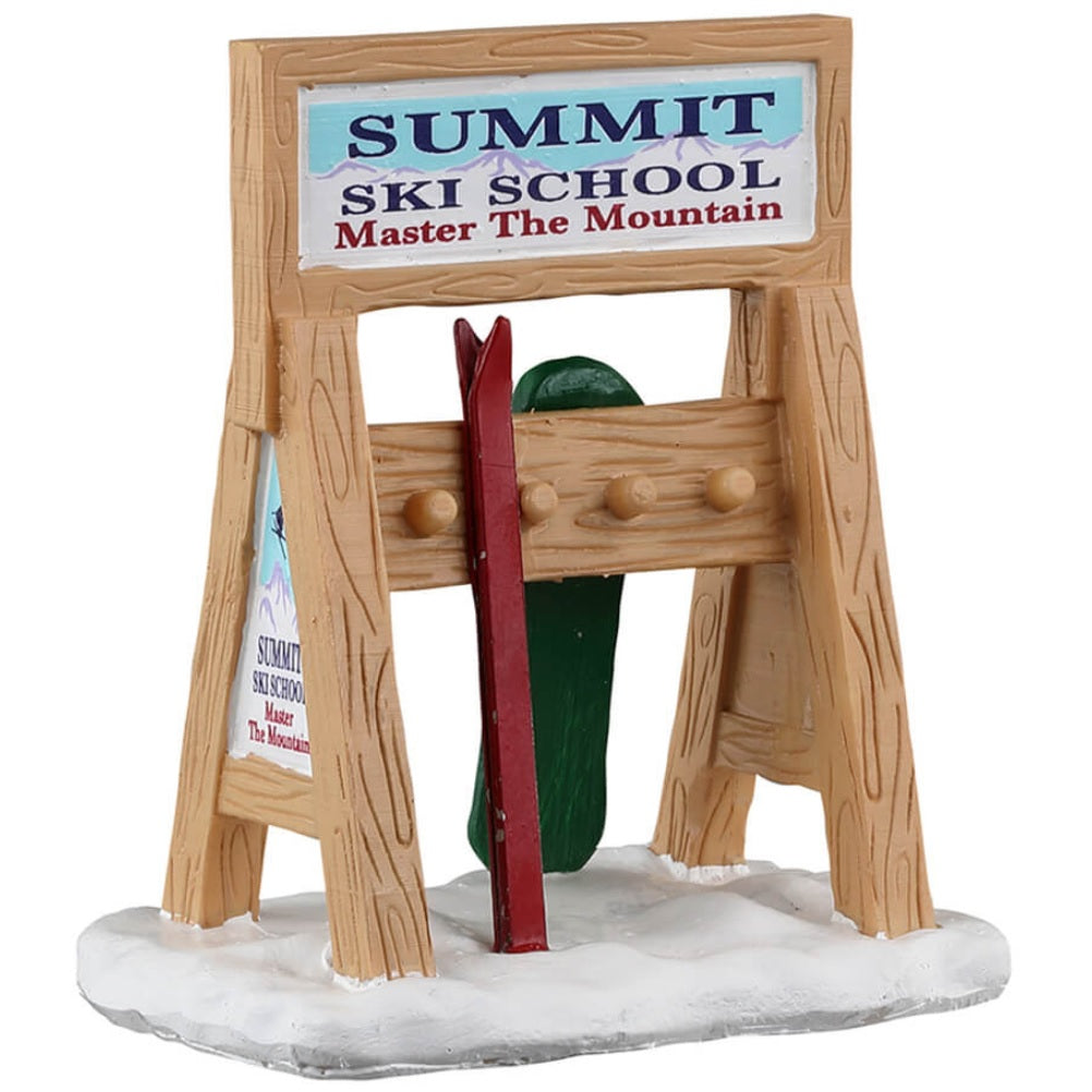 Resin village accent for a Lemax display. Designed to look like a wooden rack to hold skis and snowboards. The sign on it reads "SUMMIT SKI SCHOOL. MASTER THE MOUNTAIN."