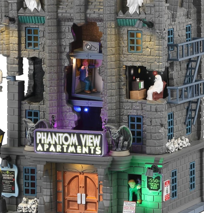Resin lighted building for a Lemax display. Designed to look like a tall stone apartment building. There are ghosts everywhere and skulls. Parts of the building are missing so you can see ghosts inside their homes.