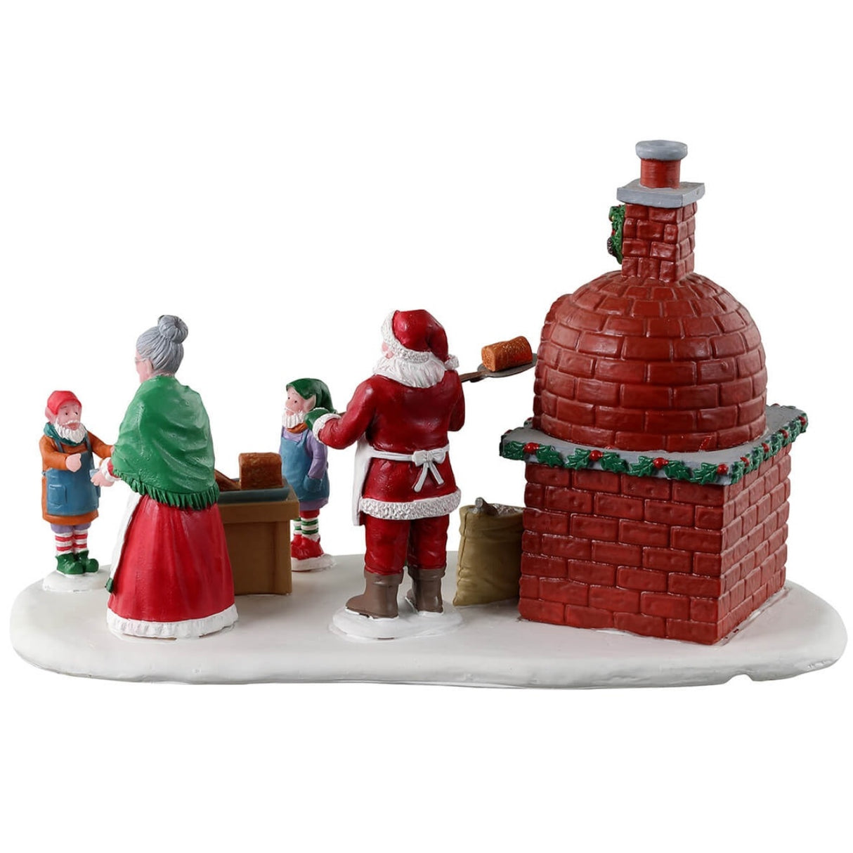 Resin village accent for a Lemax display. Designed to look like Santa and Mrs. Claus cooking gingerbread in a wood-fired oven. There are three elves helping.