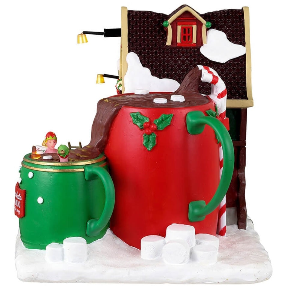 Resin lighted building for a Lemax display. Designed to look like a spa made out of mugs and hot chocolate. The snow is made out of marshmallows.