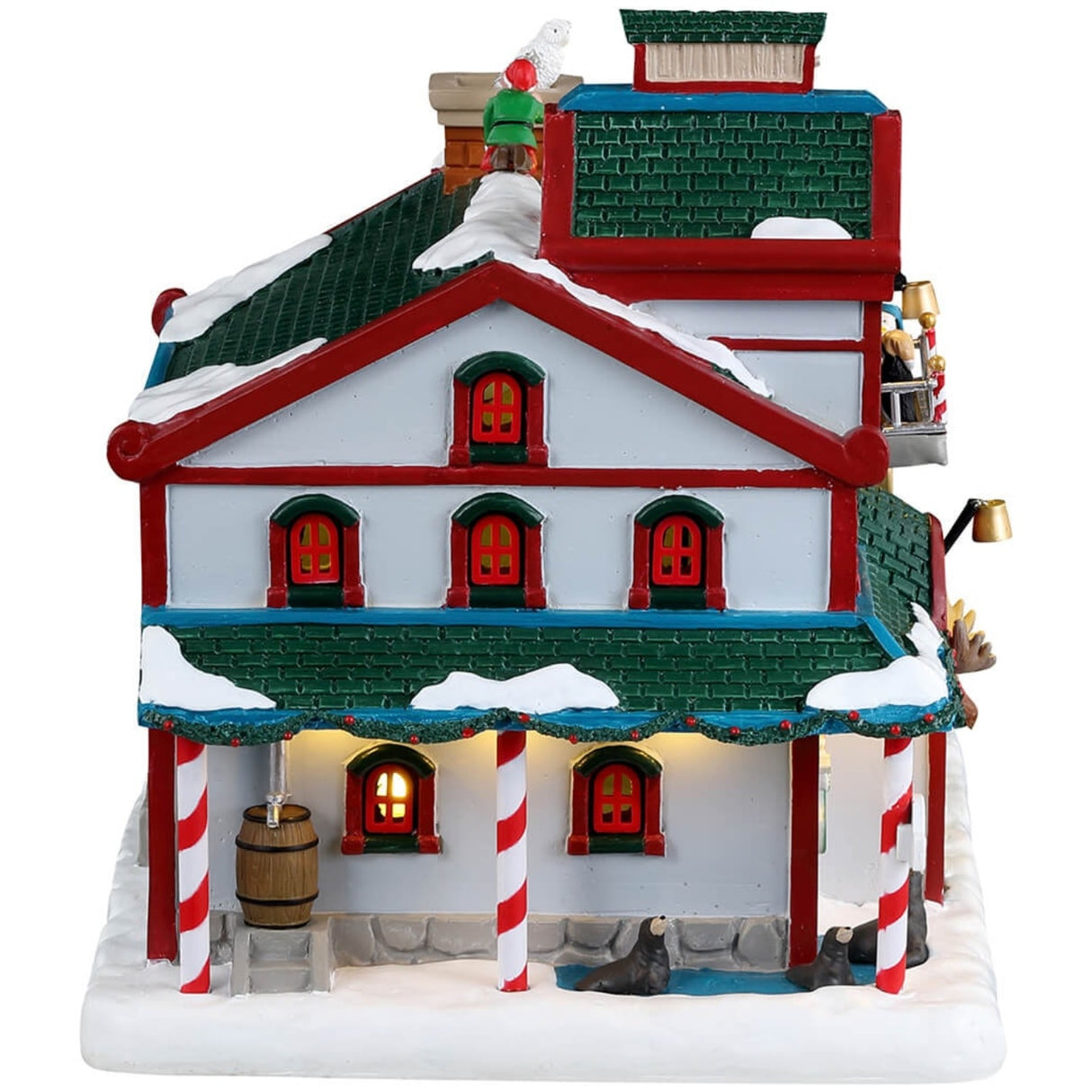 Resin lighted building for a Lemax display. Designed to look like a snow covered animal sanctuary. There are elves everywhere helping with the animals and helping to decorate a Christmas tree on the balcony.