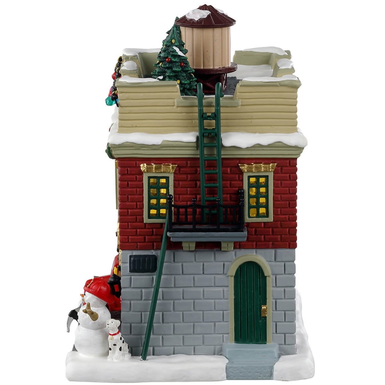 Porcelain lighted building for a Lemax display. Designed to look like a fire house decorated for Christmas. There are decorated trees and multi-colored lights on the roof. There are ladders on both sides of the building. In the window, you can see a decorated tree inside. There's a red firetruck parked in the garage and a snowman on the sidewalk.