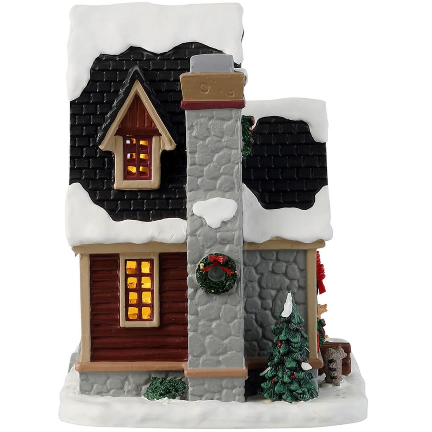 Porcelain lighted building for a Lemax display. Designed to look like a snow-covered log cabin. There are decorated wreaths, garland and Christmas trees. There's also a dog wearing a Santa hat near the front porch.