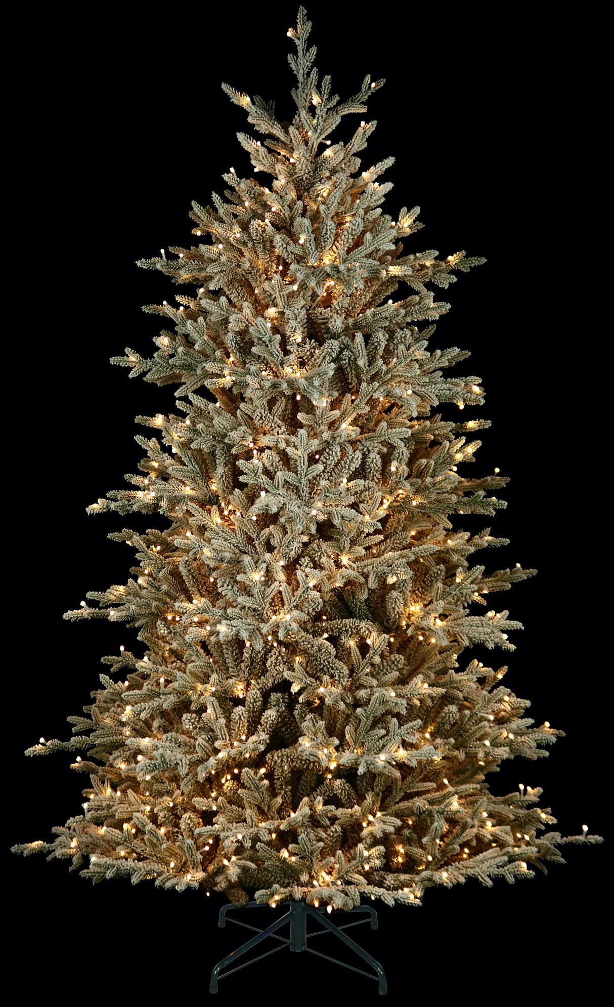Artificial tree pre-lit with Starry lights. The branches are decorated with white to appear covered in snow.