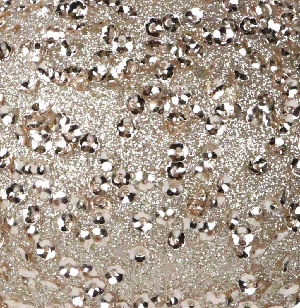 Taupe colored glittery ornament.