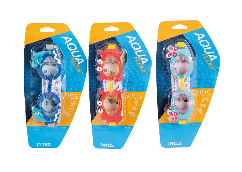 Fun swimming goggles for kids. One features light blue eye cups with pink butterflies and flowers on it with a yellow strap. One features red eye cups that are shaped like crabs with a yellow strap. One features blue eye cups with light blue smiling sharks and a gray strap.