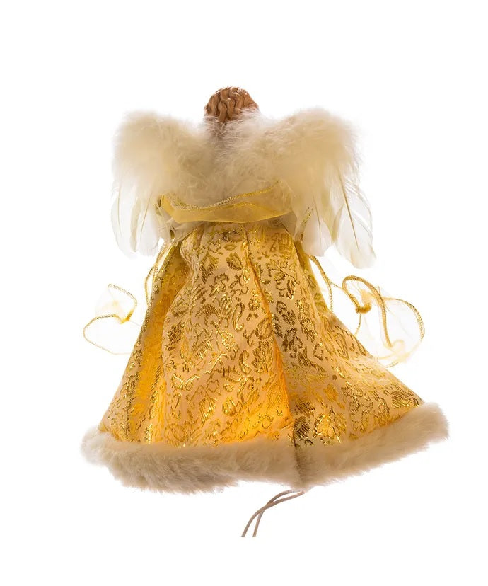 This image shows the back of the angel, highlighting the elegant gold design on her dress.