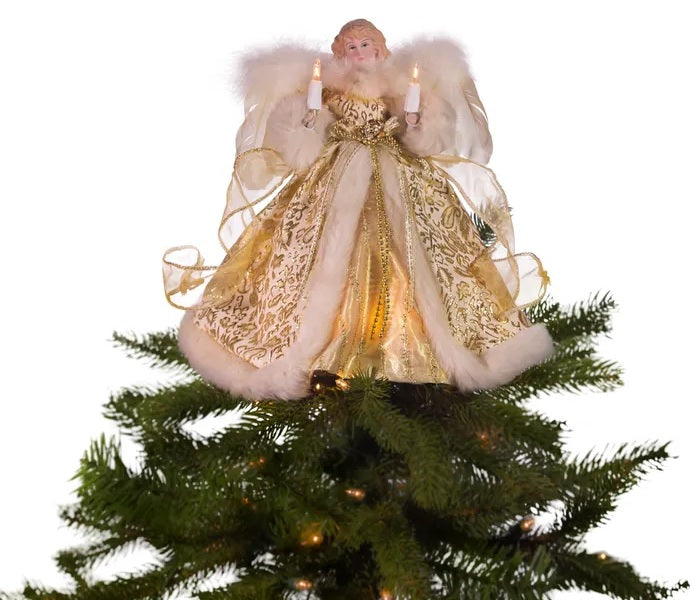 This is another lifestyle image showing the angel on top of a tree on a white background.
