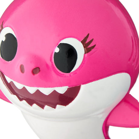 Baby Shark themed ornaments. Baby Shark is yellow. Mommy Shark is pink. Daddy Shark is blue.