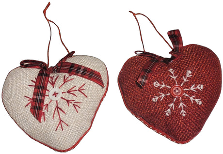 Heart-shaped Christmas ornament. One ornament is red with a white snowflake in the center. One ornament is white with a red snowflake in the center.