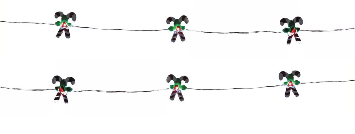 This image shows the pure white, red and green lighted candy canes.