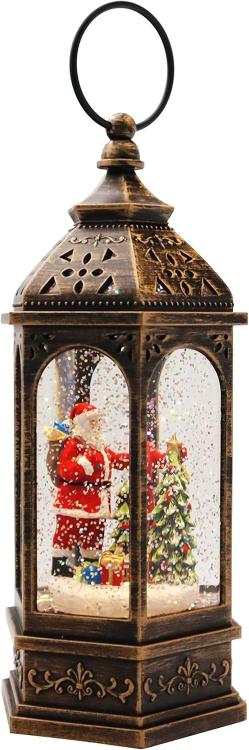 Bronze lanterns with snow globe inside. One lantern features a snowman with two kids. One lantern features Santa with a tree. One lantern features a decorated tree with presents underneath. There's swirling glitter and lights inside.