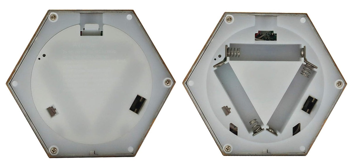 Bronze lanterns with snow globe inside. One lantern features a snowman with two kids. One lantern features Santa with a tree. One lantern features a decorated tree with presents underneath. There's swirling glitter and lights inside.