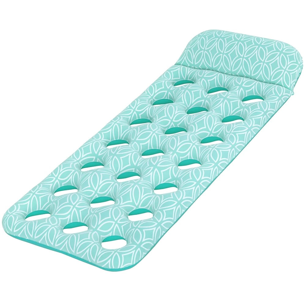 This image shows the pool float on a white background. The float itself is a teal color with an intricate white design throughout. There are holes on the mat so you can feel the water as you float.