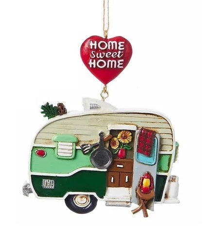 One ornament features an airstream and reads "Happy Camper." One ornament features a trailer and reads "Home Sweet Home."