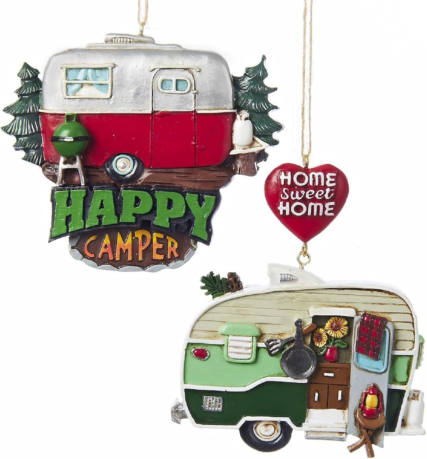 One ornament features an airstream and reads "Happy Camper." One ornament features a trailer and reads "Home Sweet Home."