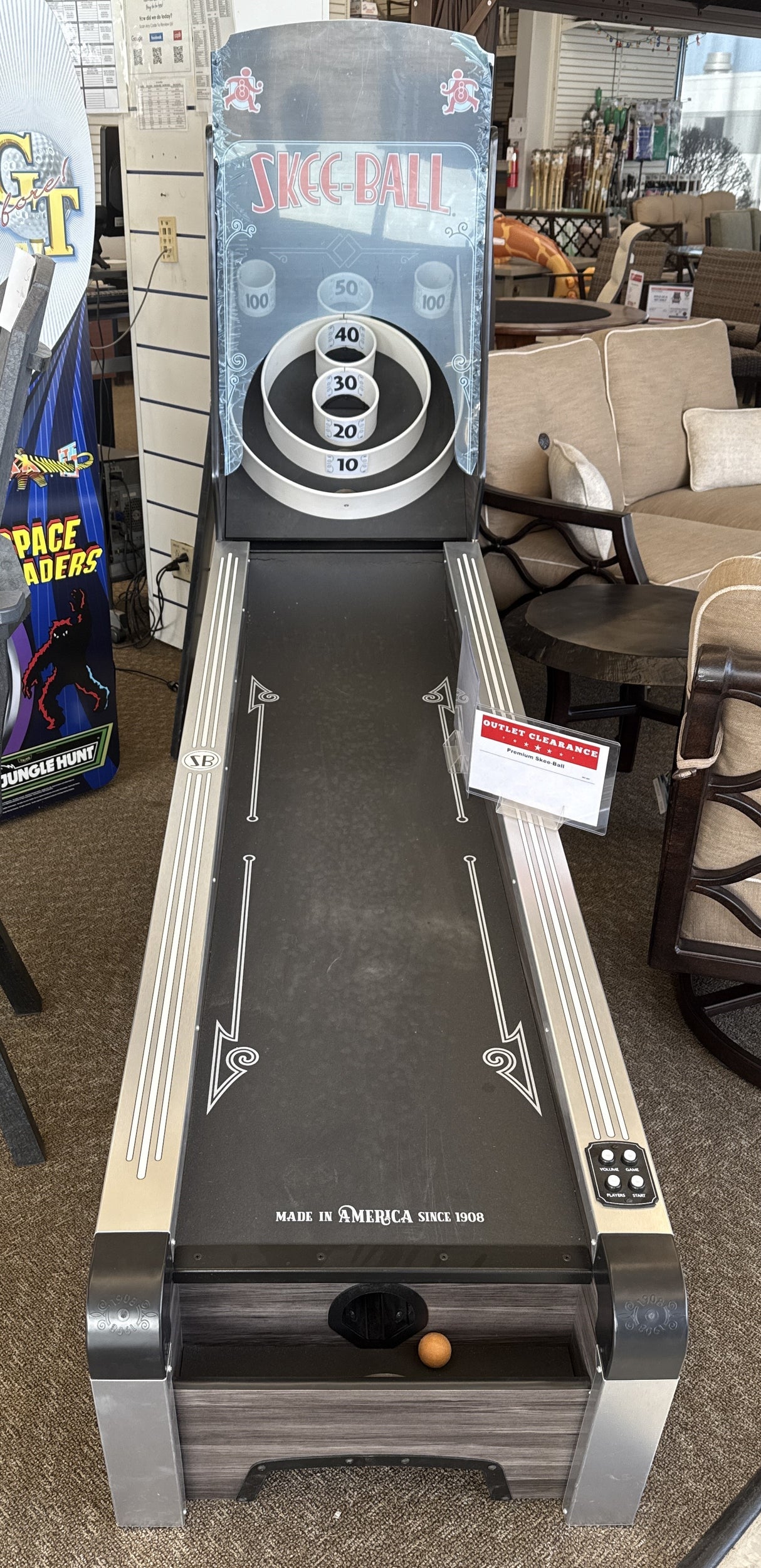 This image shows the skeeball table inside of the Tinley Park American Sale outlet store.