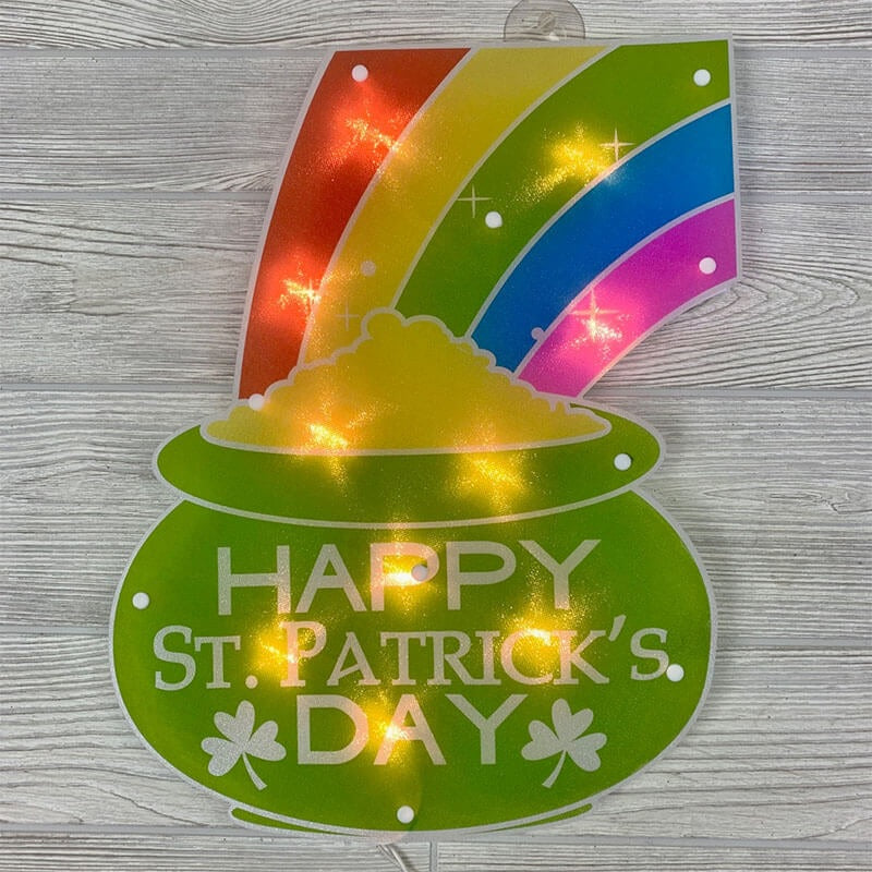 Decoration shaped like a pot of gold with a rainbow coming out of it. On the pot, it reads "Happy St. Patrick's Day!"