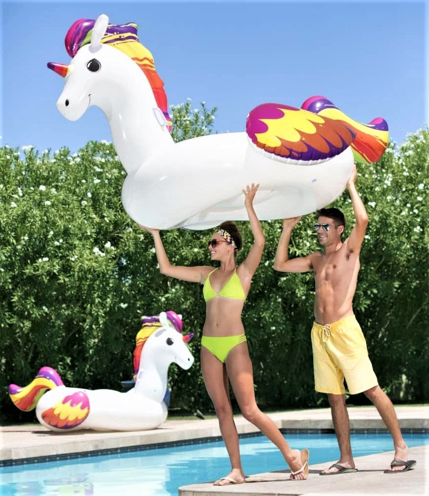 Inflatable pool float shaped like a white and rainbow unicorn.