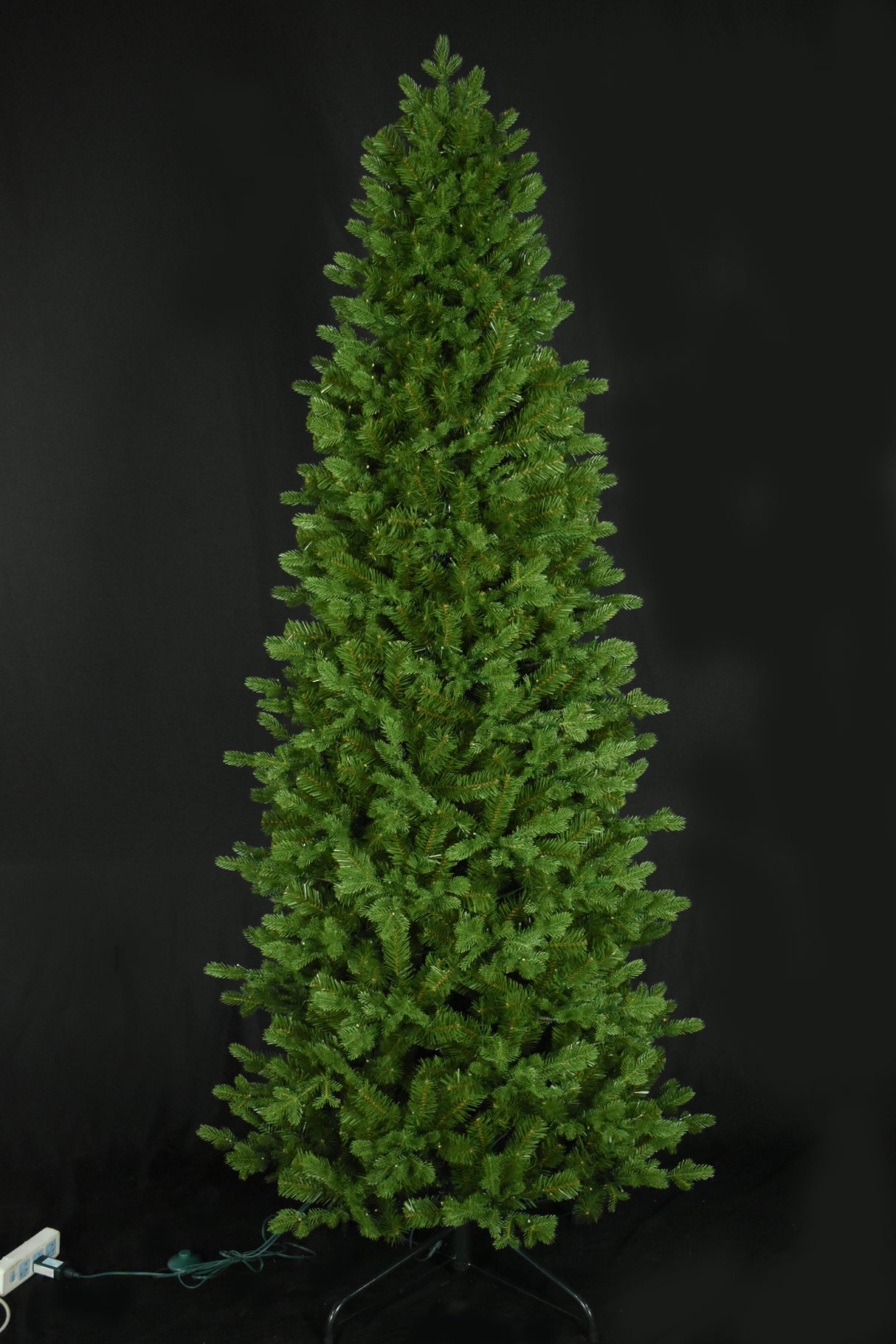 Artificial noble fir tree pre-lit with 750 starry LED lights. The lights can change from warm white to multi-colored.