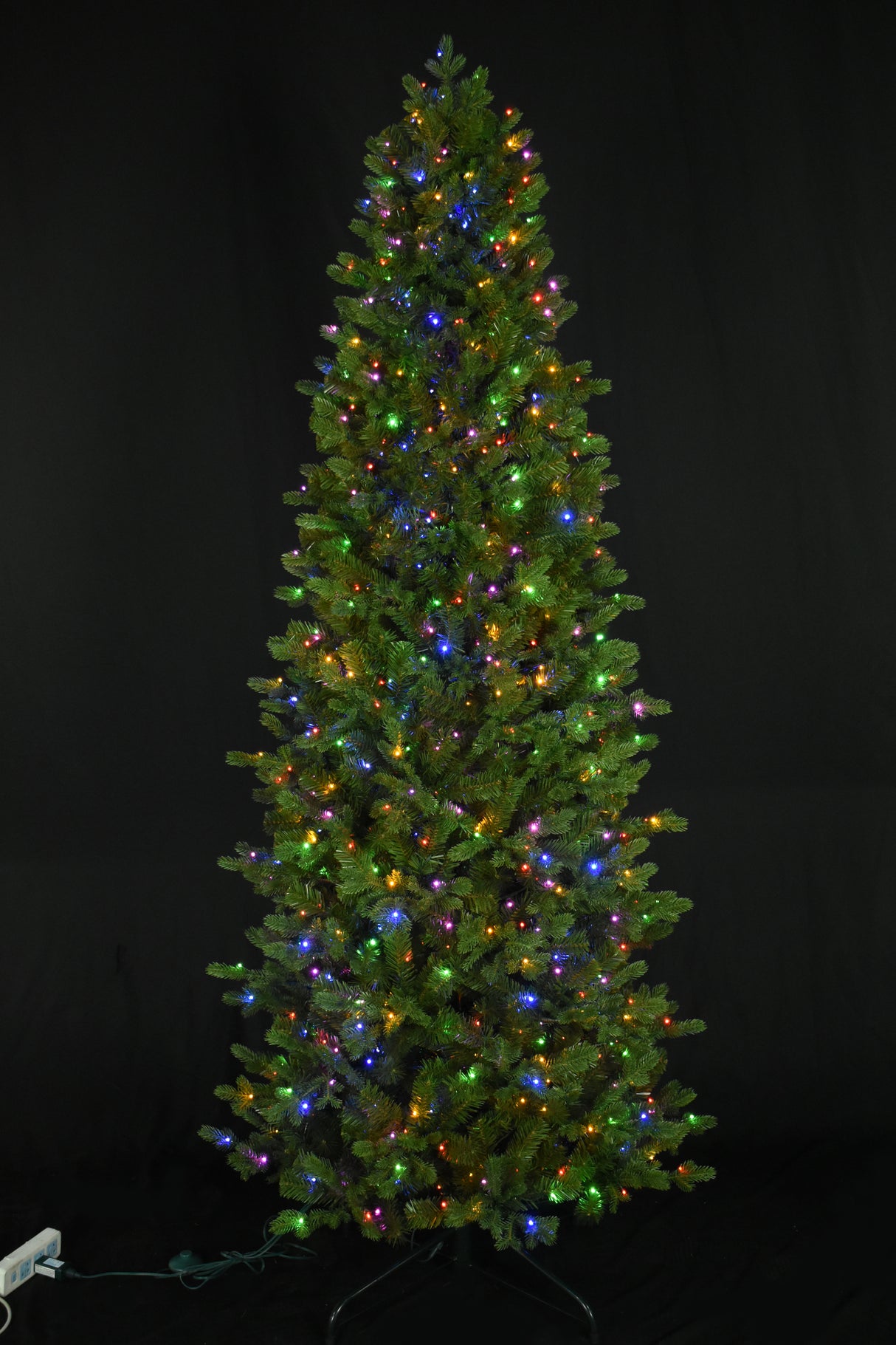 Artificial noble fir tree pre-lit with 750 starry LED lights. The lights can change from warm white to multi-colored.