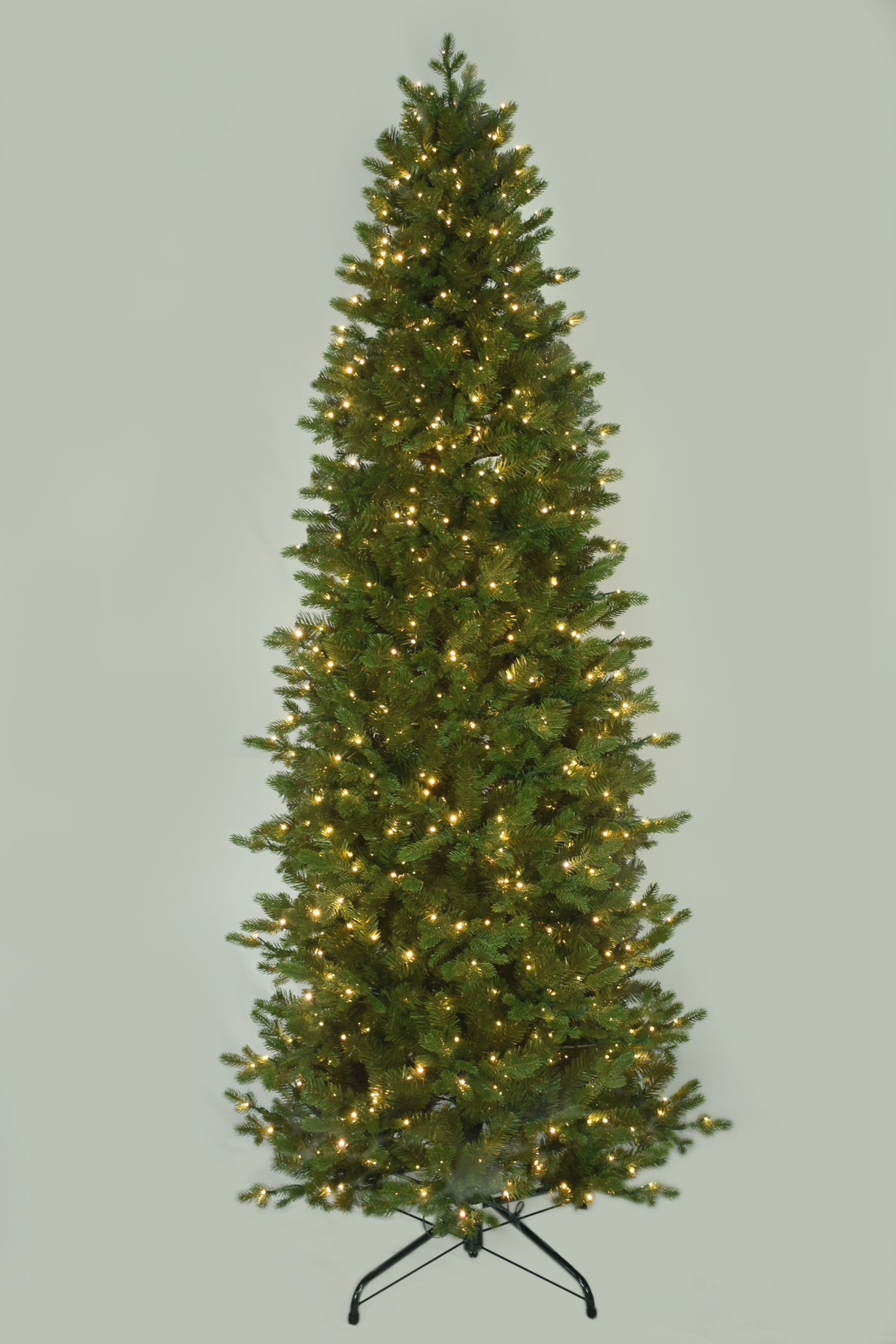 Artificial noble fir tree pre-lit with 750 starry LED lights. The lights can change from warm white to multi-colored.