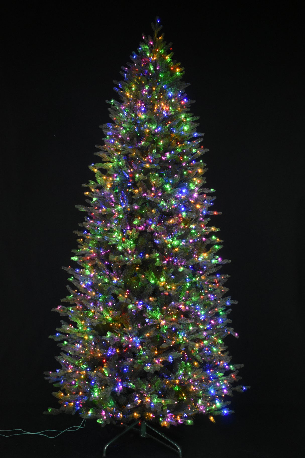 Artificial tree pre-lit with Color-Changing Starry LED lights.