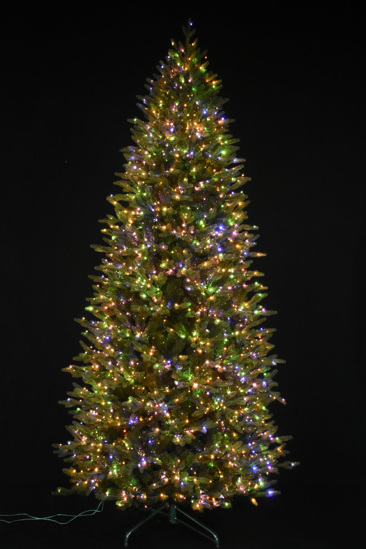 Artificial tree pre-lit with Color-Changing Starry LED lights.