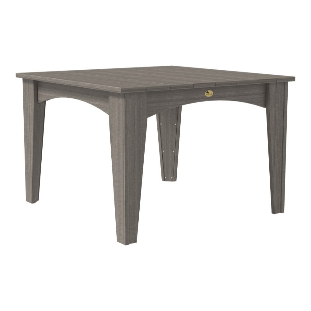 This is the Coastal Gray colored square dining table on a white background.