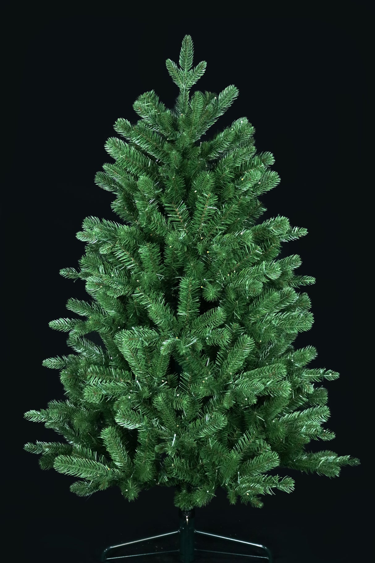 Artificial Christmas tree pre-lit with color-changing LED lights.