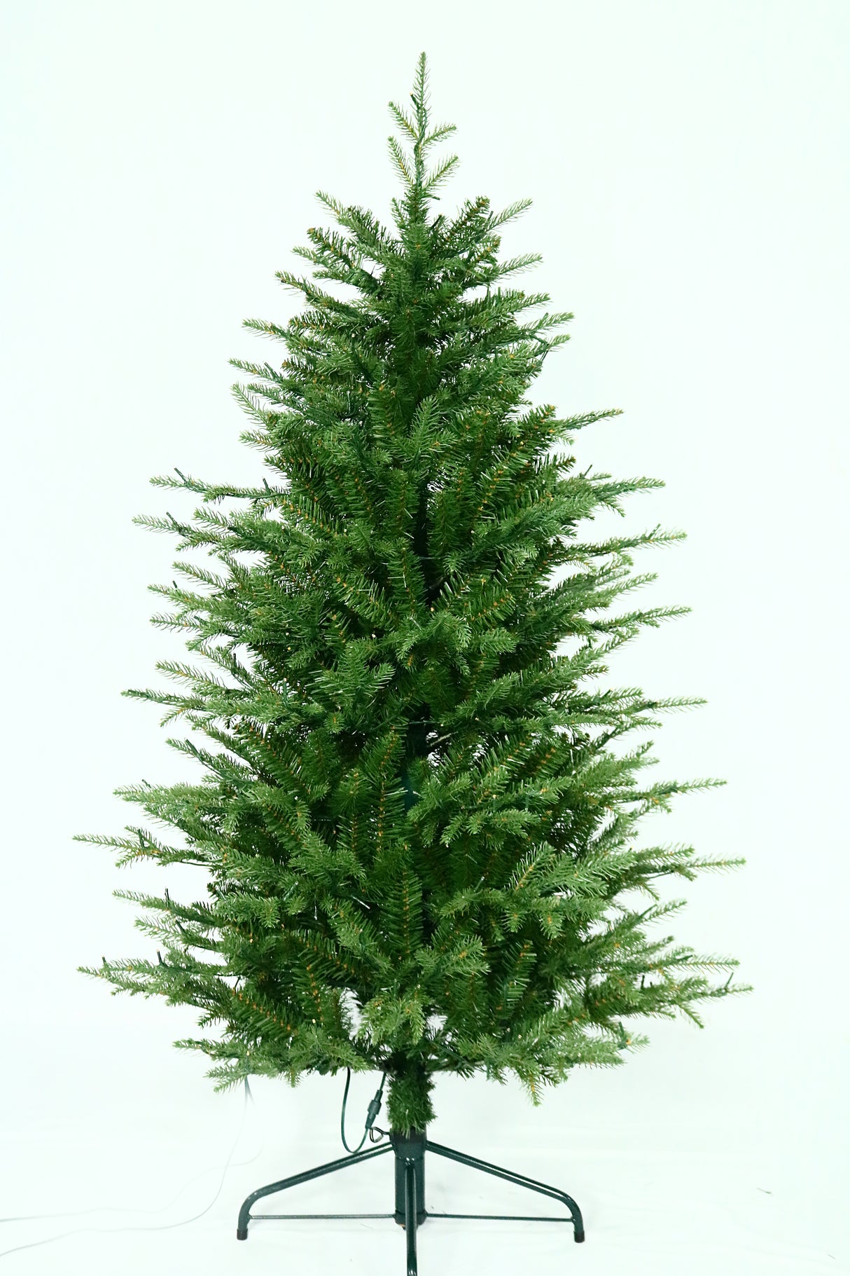 Artificial Christmas tree pre-lit with color-changing LED lights.