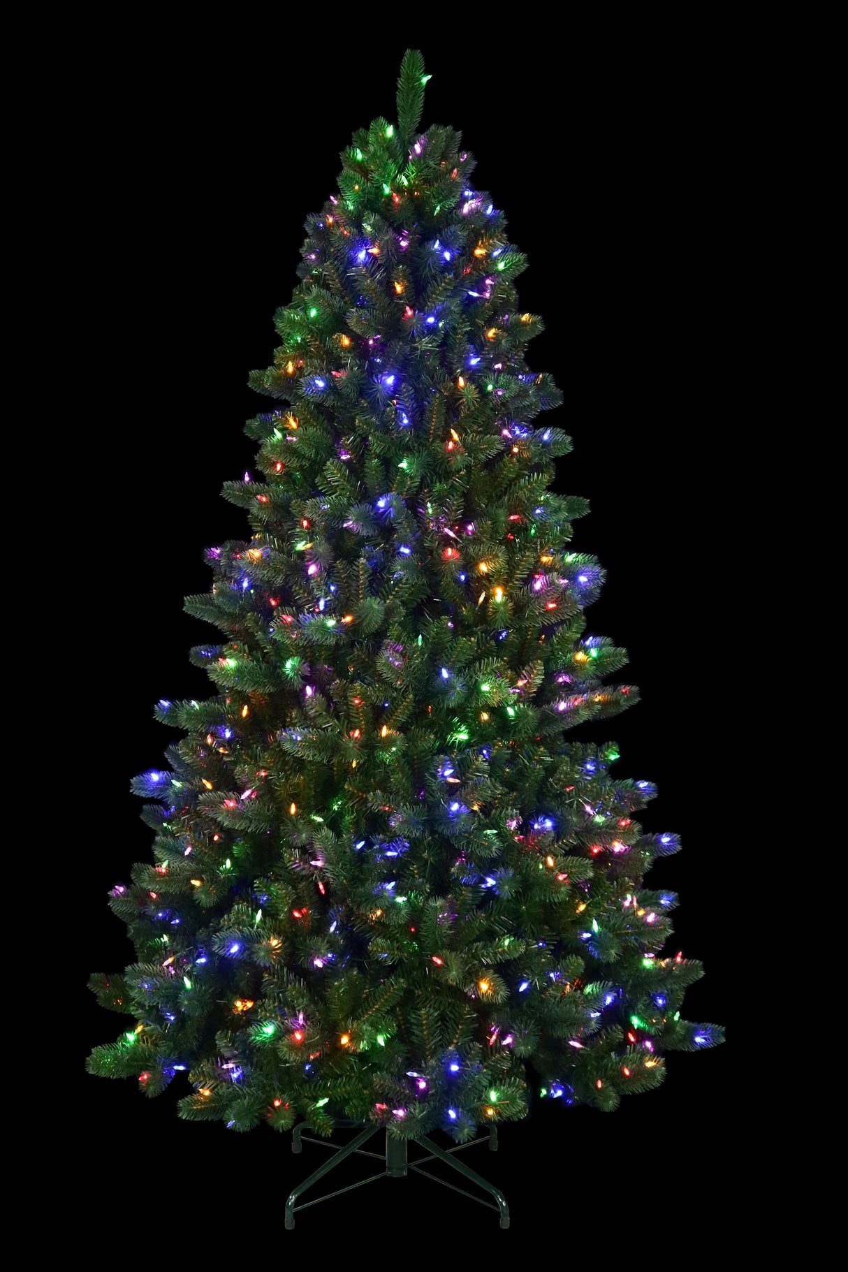 This is an artificial tree with Multi-Colored Starry Lights on. This tree is up against a black background.