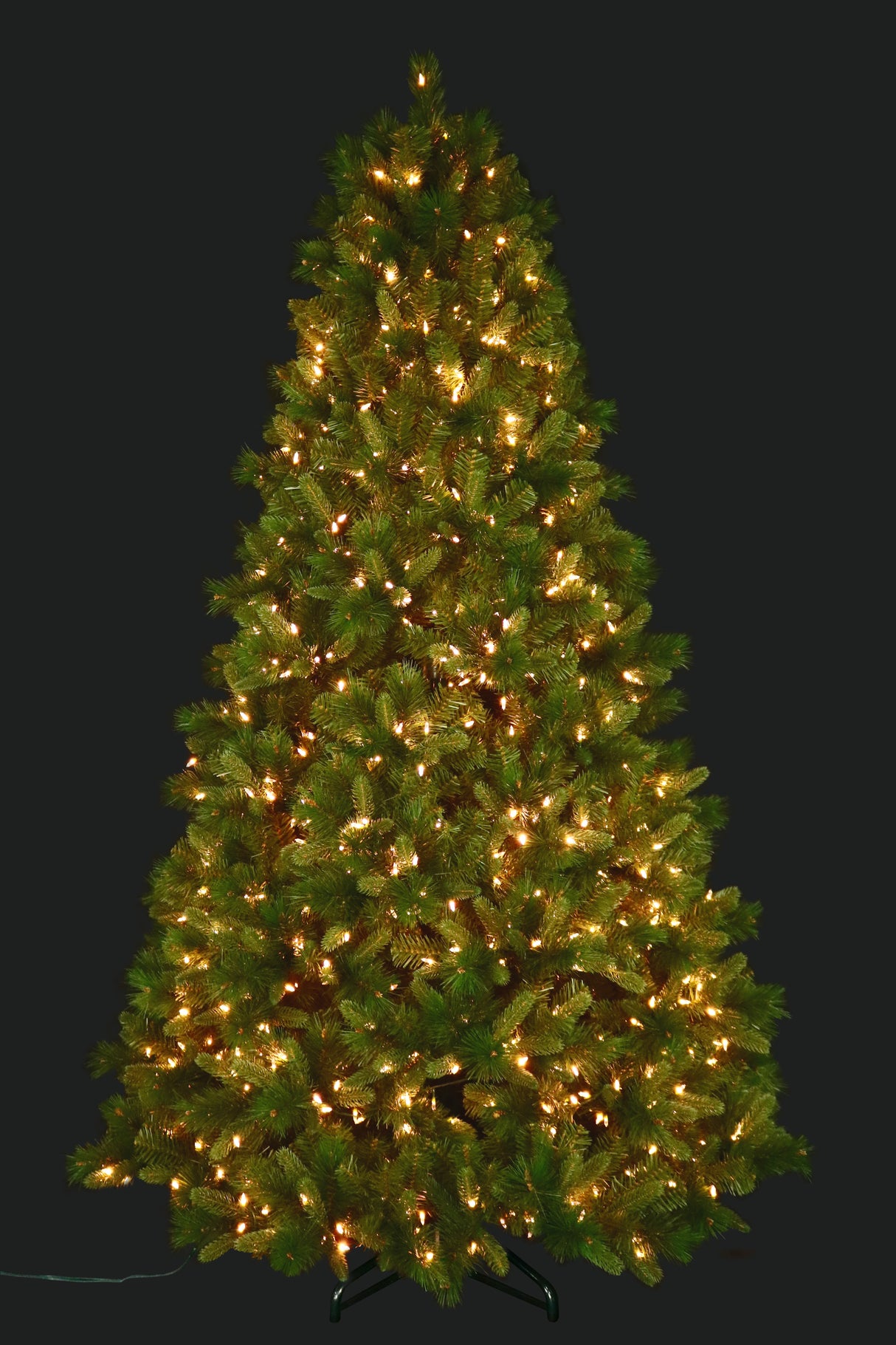 Artificial pine tree pre-lit with color-changing LED lights. In this image, the lights are warm white.