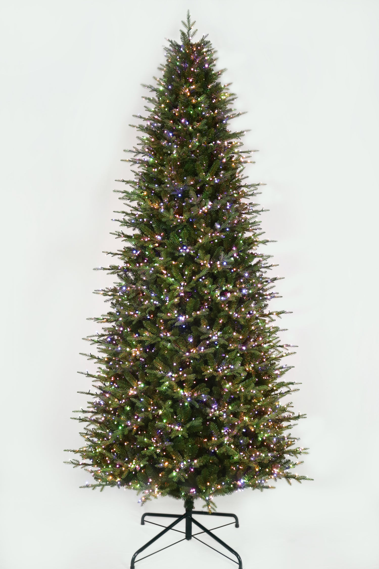 This 11 ft. artificial Christmas tree is pre-lit with Multi-Colored Starry Lights. This tree is up against a white background.